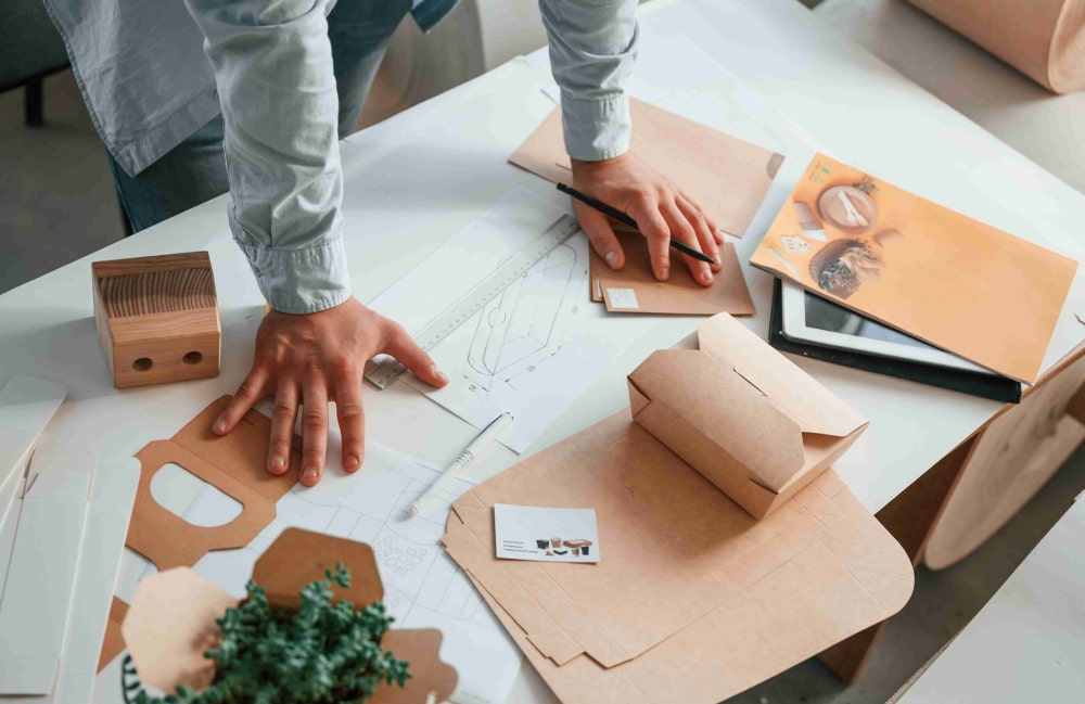 ProTech OEM Packaging Design Services Team Reviewing Print Artwork